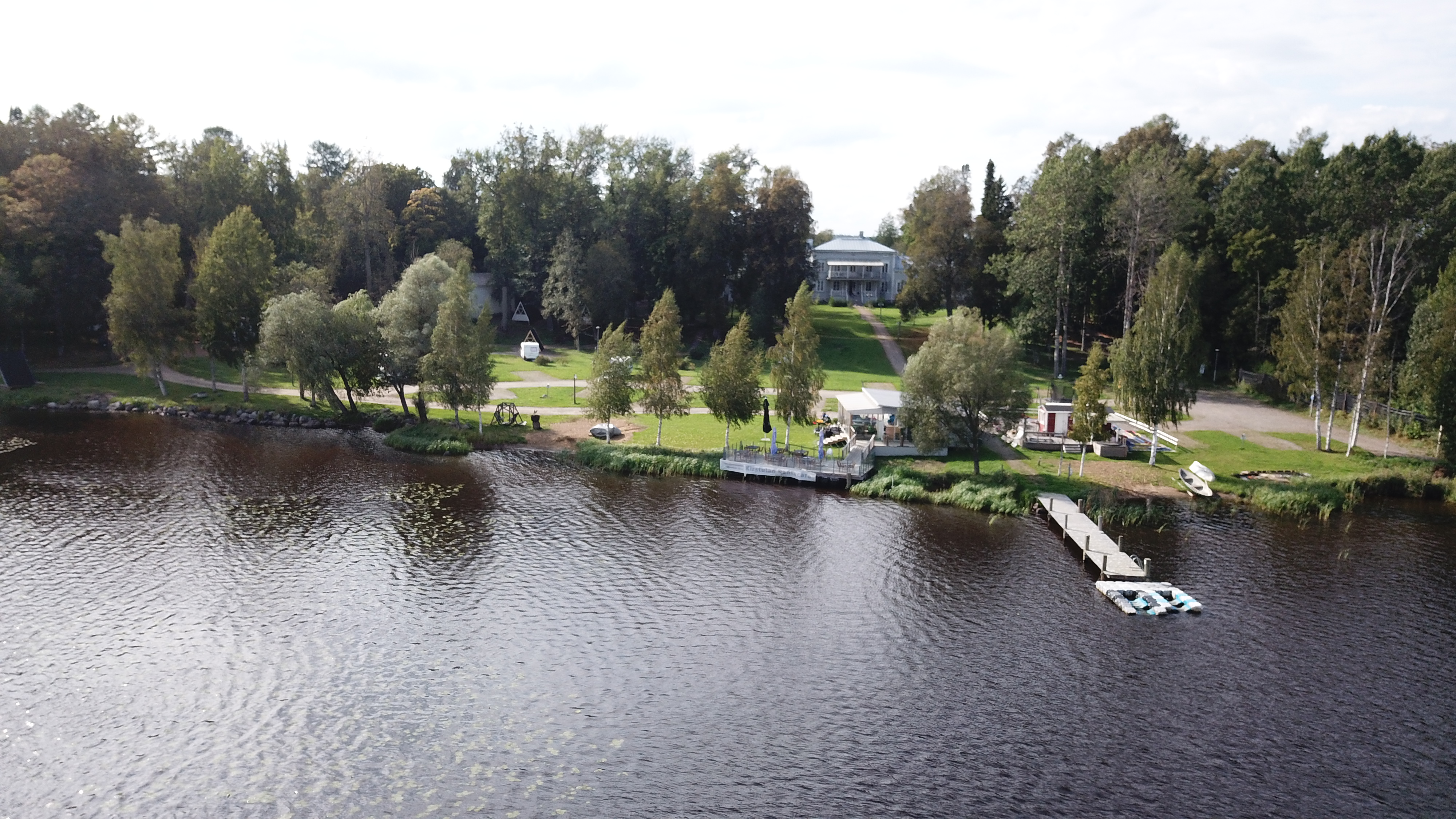 Current aerial view of the shoreline and park at Kirstulan Kartano